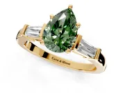 3 Stone Engagement Ring Setting for Fancy Green Pear-Shaped Center with Channel Baguette Accents and Prong Head in Yellow Gold