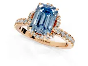 Halo Engagement Ring Setting for Fancy Blue Emerald Cut Center with Openwork Halo, Pave Band and Prong Head in Rose Gold