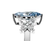 Floral Engagement Ring Setting for Fancy Blue Marquise Center with Marquise Cluster Shoulders and Prong Head in Platinum