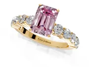 Shared-Prong Engagement Ring Setting for Fancy Pink Emerald Cut Center with Graduated Accents and Prong Head in Yellow Gold