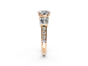 Channel-Set Engagement Ring Setting for Round Cut Center with Baguette Band and Prong Head in Rose Gold