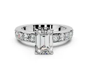 Solitaire Engagement Ring Setting for Emerald Cut Center with Channel-Set Accents and Prong Head in Platinum
