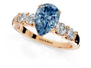 5 Stone Engagement Ring Setting for Fancy Blue Pear-Shaped Center with Plain Band and Prong Head in Rose Gold
