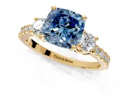3 Stone Engagement Ring Setting for Fancy Blue Cushion Cut Center with Round Cut Side Accents and Prong Head in Yellow Gold