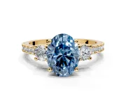 3 Stone Engagement Ring Setting for Fancy Blue Oval Center with Round Cut Side Accents and Prong Head in Yellow Gold