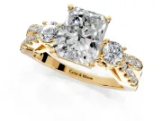 3 Stone Engagement Ring Setting for Radiant Cut Center with Pave Split Shank and Prong Head in Yellow Gold