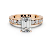 Solitaire Engagement Ring Setting for Emerald Cut Center with Channel-Set Accents and Prong Head in Rose Gold
