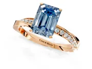 Side Accent Engagement Ring Setting for Fancy Blue Emerald Cut Center with Accent Shoulders and Prong Head in Rose Gold