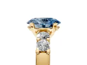 5 Stone Engagement Ring Setting for Fancy Blue Oval Center with Plain Band and Prong Head in Yellow Gold