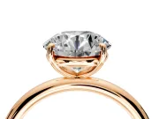 Low-Set Solitaire Engagement Ring Setting for Round Cut Center with Thin Plain Band and Prong Head in Rose Gold