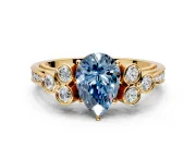 Cluster Engagement Ring Setting for Fancy Blue Pear-Shaped Center with Bezel Accent Clusters and Prong Head in Yellow Gold