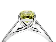 Solitaire Engagement Ring Setting for Fancy Yellow Emerald Cut Center with Cathedral Channel Band and Prong Head in Platinum