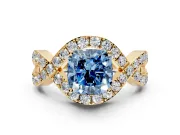 Halo Engagement Ring Setting for Fancy Blue Cushion Cut Center with Pave Infinity Twist Band and Prong Head in Yellow Gold