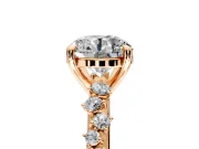 Solitaire Engagement Ring Setting for Round Cut Center with Trailing Leaf Accent Band and Prong Head in Rose Gold