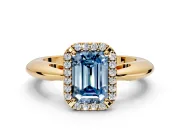 Halo Engagement Ring Setting for Fancy Blue Emerald Cut Center with Tapered Plain Band and Prong Head in Yellow Gold