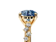 Solitaire Engagement Ring Setting for Fancy Blue Round Cut Center with Trailing Leaf Accent Band and Prong Head in Yellow Gold