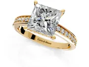 Solitaire Engagement Ring Setting for Princess Cut Center with Channel-Set Accent Band and Prong Head in Yellow Gold
