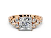 Cluster Engagement Ring Setting for Princess Cut Center with Bezel Accent Clusters and Prong Head in Rose Gold