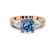 3 Stone Engagement Ring Setting for Fancy Blue Cushion Cut Center with Tapered Baguettes, Plain Band and Prong Head in Rose Gold