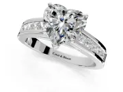 Solitaire Engagement Ring Setting for Heart-Shaped Center with Princess Cut Channel Band and Prong Head in Platinum