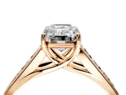 Solitaire Engagement Ring Setting for Emerald Cut Center with Round Cut Channel Band and Prong Head in Rose Gold
