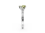 3 Stone Engagement Ring Setting for Fancy Yellow Heart-Shaped Center with Channel Baguette Accents and Prong Head in White Gold