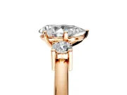 3 Stone Engagement Ring Setting for Pear-Shaped Center with Wide Plain Band and Prong Head in Rose Gold