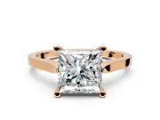 Solitaire Engagement Ring Setting for Princess Cut Center with Tapered Shoulders and Prong Head in Rose Gold