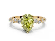 Cluster Engagement Ring Setting for Fancy Yellow Pear-Shaped Center with Round Cut Accent Band and Prong Head in Yellow Gold