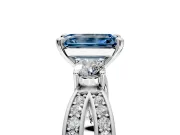 3 Stone Engagement Ring Setting for Fancy Blue Emerald Cut Center with Pave Twist Band and Prong Head in Platinum