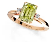 3 Stone Engagement Ring Setting for Fancy Yellow Emerald Cut Center with Low-Set Round Cut Accents and Prong Head in Rose Gold