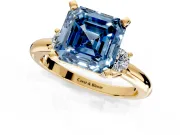 3 Stone Engagement Ring Setting for Fancy Blue Asscher Cut Center with Wide Plain Band and Prong Head in Yellow Gold