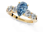 5 Stone Engagement Ring Setting for Fancy Blue Pear-Shaped Center with Graduated Accents and Prong Head in Yellow Gold