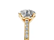 Solitaire Engagement Ring Setting for Round Cut Center with Channel Accents and Prong Head in Yellow Gold