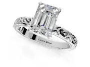 Solitaire Engagement Ring Setting for Emerald Cut Center with Scrollwork Band and Prong Head in Platinum