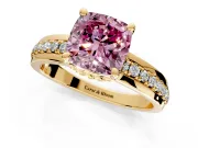 Solitaire Engagement Ring Setting for Fancy Pink Cushion Cut Center with Raised Channel Band and Prong Head in Yellow Gold