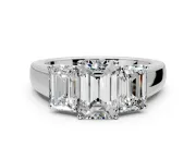 3 Stone Engagement Ring Setting for Emerald Cut Center with Raised Basket Heads and Prong Head in Platinum