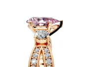 3 Stone Engagement Ring Setting for Fancy Pink Pear-Shaped Center with Pave Twist Band and Prong Head in Rose Gold