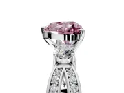 3 Stone Engagement Ring Setting for Fancy Pink Heart-Shaped Center with Pave Twist Band and Prong Head in Platinum