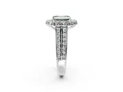 Large Accent Halo Engagement Ring Setting for Fancy Green Emerald Cut Center with Pave Split Shank and Prong Head in Platinum