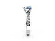 Solitaire Engagement Ring Setting for Fancy Blue Heart-Shaped Center with Channel-Set Accents and Prong Head in Platinum
