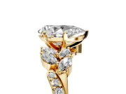 Solitaire Engagement Ring Setting for Pear-Shaped Center with Marquise Accent Twist Band and Prong Head in Yellow Gold