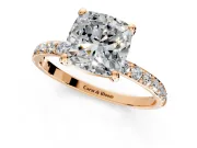 Solitaire Engagement Ring Setting for Cushion Cut Center with Pave Accents and Prong Head in Rose Gold