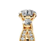 3 Stone Engagement Ring Setting for Round Cut Center with Pave Twist Band and Prong Head in Yellow Gold