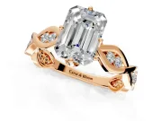 Solitaire Engagement Ring Setting for Emerald Cut Center with Accented Twist Band and Leaf Prong Head in Rose Gold