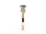 Solitaire Engagement Ring Setting for Fancy Blue Round Cut Center with Crossover Accents and Prong Head in Yellow Gold