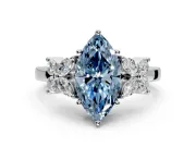 Floral Engagement Ring Setting for Fancy Blue Marquise Center with Marquise Cluster Shoulders and Prong Head in Platinum
