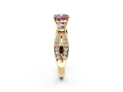 3 Stone Engagement Ring Setting for Fancy Pink Cushion Cut Center with Pave Twist Band and Prong Head in Yellow Gold