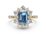 Floral Halo Engagement Ring Setting for Fancy Blue Emerald Cut Center with Pave Accents and Prong Head in Yellow Gold