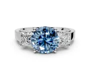 3 Stone Engagement Ring Setting for Fancy Blue Round Cut Center with Matching Side Accents and Prong Head in Platinum